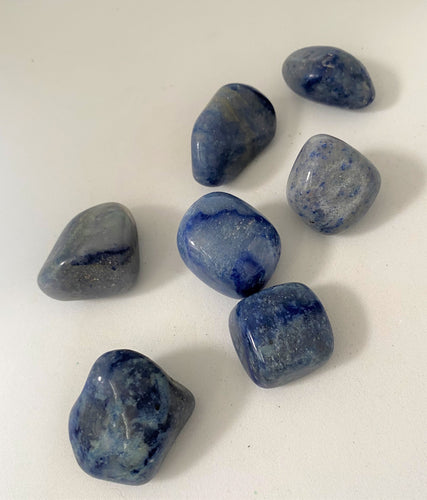 Blue Quartz Crystal tumble stone on white background
