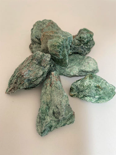 Fuchsite Crystal Roughs on white background