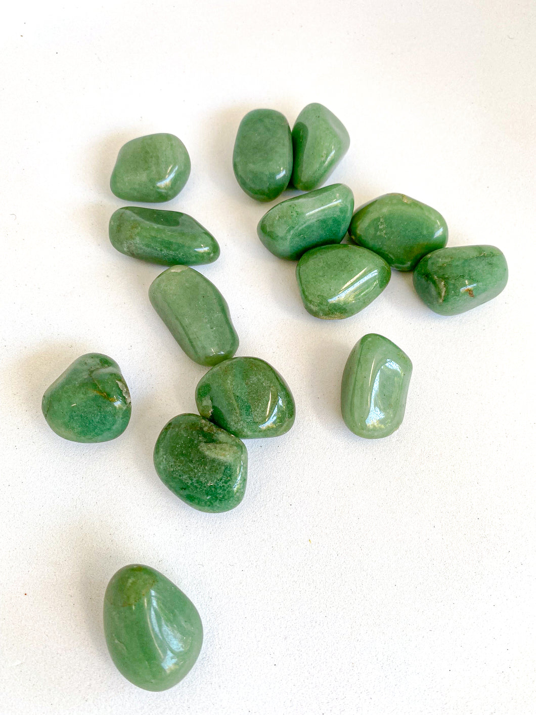 Green Aventurine Tumble Stones on White Background