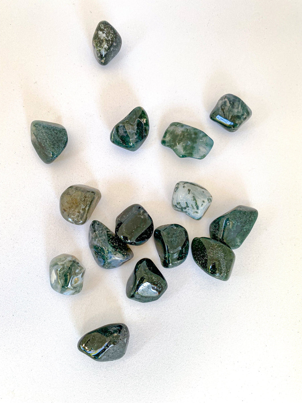 Green Moss Agate Tumble Stones on White Background