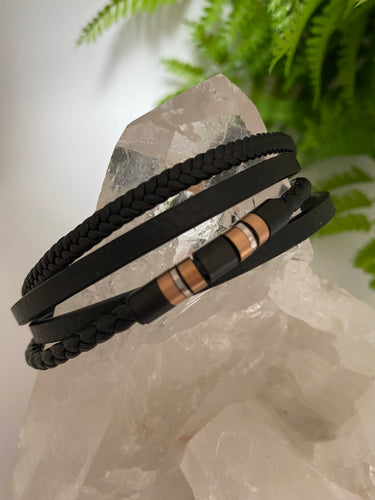 Leather bracelet with copper Mens on white background
