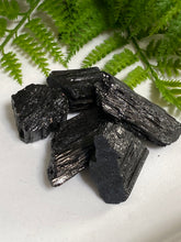Load image into Gallery viewer, Black Tourmaline crystal rough on white background
