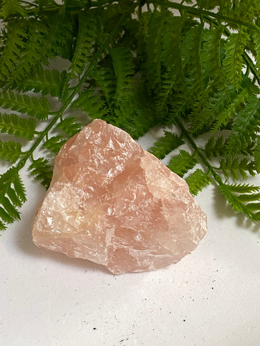 Rose Quartz Crystal rough on white background